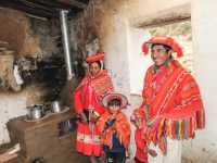 Transforming Lives: A family in Huilloc Village receives a gift of a clean cook stove, ensuring healthier indoor air quality in their kitchen.